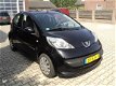 Peugeot 107 - 1.0-12V XR airco, km stand gegarandeerd met boekjes - 1 - Thumbnail