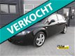 Seat Leon - 1.6 Stylance Airco Clima Cruise Control Zwart - 1 - Thumbnail