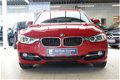 BMW 3-serie Touring - 320I UPGRADE EDITION LEER / XENON / SPORTSTOELEN / - 1 - Thumbnail