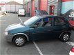 Opel Corsa - 1.4i Eco, ZUINIG, APK, €499, - 1 - Thumbnail