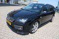 Ford Focus Wagon - 2.0 Futura + Styling pakket, DVD speler, airco, cruisecontrol, trekhaak etc - 1 - Thumbnail