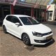 Volkswagen Polo - 1.0 BlueMotion Edition navigatie / airco / cruise / getinte ramen achter / lm velg - 1 - Thumbnail