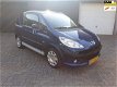 Peugeot 1007 - 1.4 Urban AIRCO CV WENIG KM BLAUW RADIO CD - 1 - Thumbnail