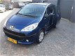 Peugeot 1007 - 1.4 Urban AIRCO CV WENIG KM BLAUW RADIO CD - 1 - Thumbnail