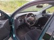 Ford Focus - 1.6-16V Ambiente - 1 - Thumbnail