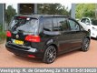 Volkswagen Touran - 1.2 TSI Comfortline BlueMotion | Navigatie | Parkeersensoren | Climate control - 1 - Thumbnail