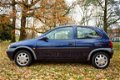 Opel Corsa - 1.2i-16V Onyx met VOL JAAR APK ( blanke lak schade ) - 1 - Thumbnail