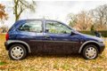 Opel Corsa - 1.2i-16V Onyx met VOL JAAR APK ( blanke lak schade ) - 1 - Thumbnail
