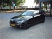 BMW 1-serie - 116i EDE Business+ nl auto leer naviegatie pdc - 1 - Thumbnail