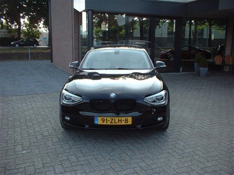 BMW 1-serie - 116i EDE Business+ nl auto leer naviegatie pdc - 1