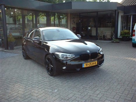 BMW 1-serie - 116i EDE Business+ nl auto leer naviegatie pdc - 1