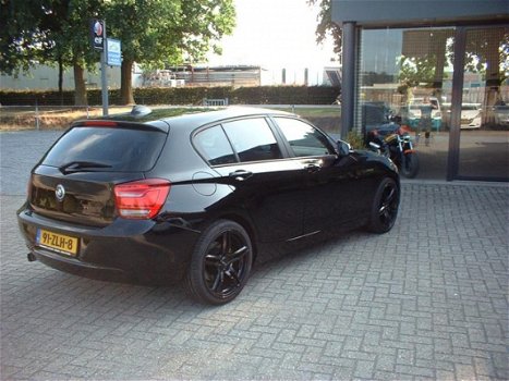 BMW 1-serie - 116i EDE Business+ nl auto leer naviegatie pdc - 1