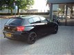 BMW 1-serie - 116i EDE Business+ nl auto leer naviegatie pdc - 1 - Thumbnail