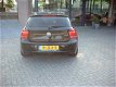 BMW 1-serie - 116i EDE Business+ nl auto leer naviegatie pdc - 1 - Thumbnail