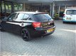 BMW 1-serie - 116i EDE Business+ nl auto leer naviegatie pdc - 1 - Thumbnail