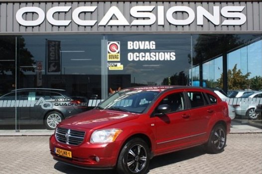 Dodge Caliber - 2.0 SPORT NAVI /TREKHAAK / WINTERSET OP LM INCL 6 MND BOVAG - 1