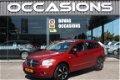 Dodge Caliber - 2.0 SPORT NAVI /TREKHAAK / WINTERSET OP LM INCL 6 MND BOVAG - 1 - Thumbnail