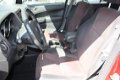 Dodge Caliber - 2.0 SPORT NAVI /TREKHAAK / WINTERSET OP LM INCL 6 MND BOVAG - 1 - Thumbnail