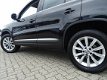 Volkswagen Tiguan - 2.0 TSI SPORT&STYLE 4MOTION 180PK ECC/NAV/REGEN.SENS/PARK.SENS - 1 - Thumbnail