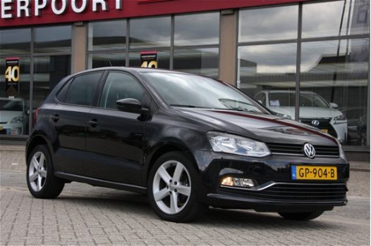 Volkswagen Polo - 1.2 TSI Highline 5drs clima/ PDC voor+achter - 1