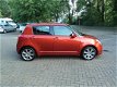 Suzuki Swift - 1.3 Comfort - 1 - Thumbnail