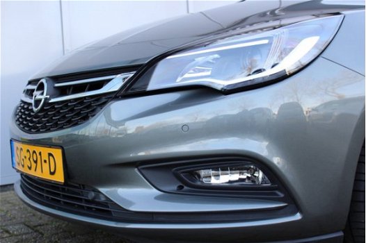 Opel Astra - 1.0 ONLINE EDITION / RIJKLAAR navi / agr stoelen / cruise / pdc - 1