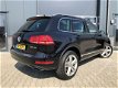 Volkswagen Touareg - - 4.2 V8 TDI 340PK Panoramadak Bi-Xenon Navi Trekhaak - 1 - Thumbnail