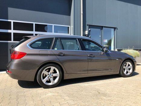 BMW 3-serie Touring - 320d 12-2013 High Ex Head-UP Sportstoelen Xenon Camera - 1