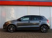 Volkswagen Polo - 1.2 TSI 5drs R-line (stoelverw, navi, clima, pdc v+a) - 1 - Thumbnail