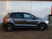 Volkswagen Polo - 1.2 TSI 5drs R-line (stoelverw, navi, clima, pdc v+a) - 1 - Thumbnail