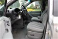 Chrysler Grand Voyager - Rolstoelauto 3.3i V6 174pk Automaat LX airco/cruise/navi - 1 - Thumbnail