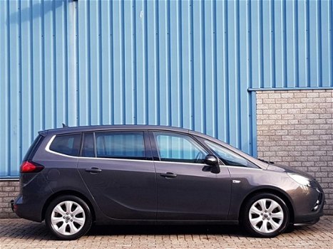 Opel Zafira Tourer - BUSINESS PLUS 7P 1.4 TURBO 140pk H6 NAVI|CLIMA|TREKHAAK|PANODAK - 1