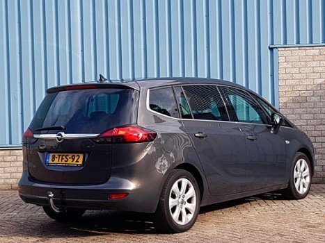 Opel Zafira Tourer - BUSINESS PLUS 7P 1.4 TURBO 140pk H6 NAVI|CLIMA|TREKHAAK|PANODAK - 1