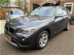 BMW X1 - 2.0d 183pk sDrive High Exe, Panoramadak, Navi, Leder, Trekhaak, - 1 - Thumbnail