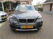 BMW X1 - 2.0d 183pk sDrive High Exe, Panoramadak, Navi, Leder, Trekhaak, - 1 - Thumbnail