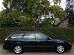 Subaru Legacy Touring Wagon - 2.0 GL AWD Airco, Haak, El. Pakket, Volledig onderhouden - 1 - Thumbnail