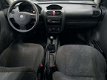 Opel Corsa - 1.2-16V Comfort - 1 - Thumbnail