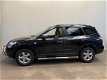 Hyundai Santa Fe - 2.7i V6 Style NAVI-LEDER-LMV-ECC-PDC-TREKHAAK End Of Year Sale - 1 - Thumbnail