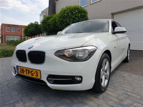 BMW 1-serie - 116i Business Sport 5 Deurs Navigatie - 1