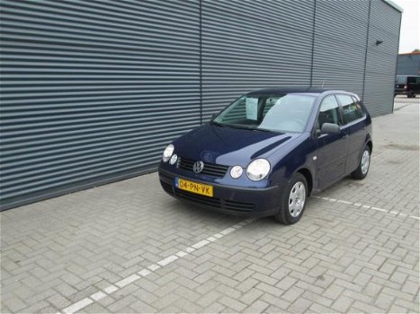 Volkswagen Polo - 1.2-12V 5 deurs airco met boekjes ingevuld lichte schade linker voor portier - 1