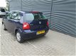 Volkswagen Polo - 1.2-12V 5 deurs airco met boekjes ingevuld lichte schade linker voor portier - 1 - Thumbnail