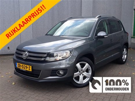 Volkswagen Tiguan - 1.4 TSI Edition RIJKLAAR 100% onderhouden airconditioning, comfortstoelen met le - 1