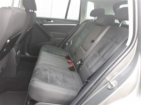 Volkswagen Tiguan - 1.4 TSI Edition RIJKLAAR 100% onderhouden airconditioning, comfortstoelen met le - 1