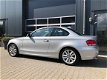 BMW 1-serie Coupé - 120D Aut Xenon Navi Schuifdak Sportstoelen Leder 120d High Executive - 1 - Thumbnail
