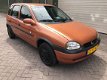 Opel Corsa - 1.2i-16V Strada deze auto heeft een nieuwe apk met airco - 1 - Thumbnail