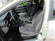 Ford Focus - 1.6-16V Titanium /CRUISE/LM-VELGEN/PARKASSIST/WINTERPAKKET - 1 - Thumbnail