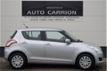 Suzuki Swift - 1.2 Comfort 1ste eig. Airco met beurt en APK - 1 - Thumbnail