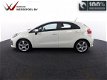 Kia Rio - 1.2 COMFORTPLUSLINE NAVI - GARANTIE 2023 - 1 - Thumbnail