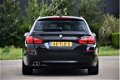 BMW 5-serie Touring - 520i aut8 High Exe PanoDak Camera 18-inch Zw-Hemel Alarm3 Sport-Aut - 1 - Thumbnail