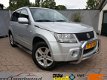 Suzuki Grand Vitara - 2.0-16V Exclusive Trekhaak/ Cruise/ Airco/ Nette auto - 1 - Thumbnail